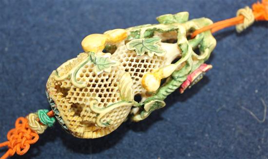 A cricket cage and a silk and ivory bead necklace, pendant & brooch